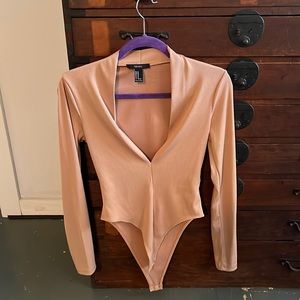 Long sleeve tan deep V bodysuit